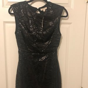 Black mini dress with sequin-open back